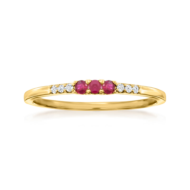 14kt yellow gold ring with ruby center stones and diamond accents along shoulders