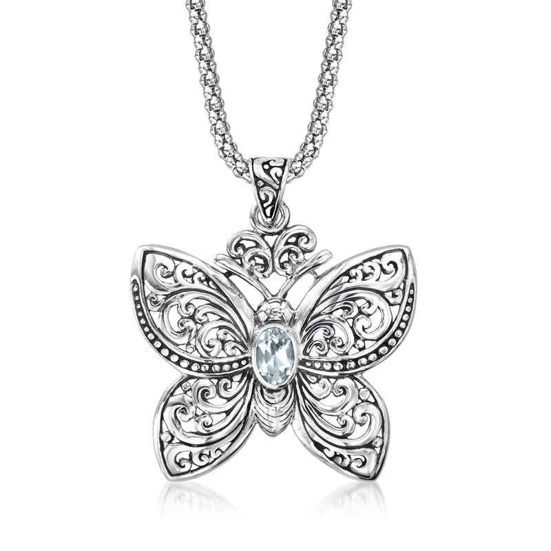 Sterling silver butterfly pendant necklace with sky-blue gemstone center
