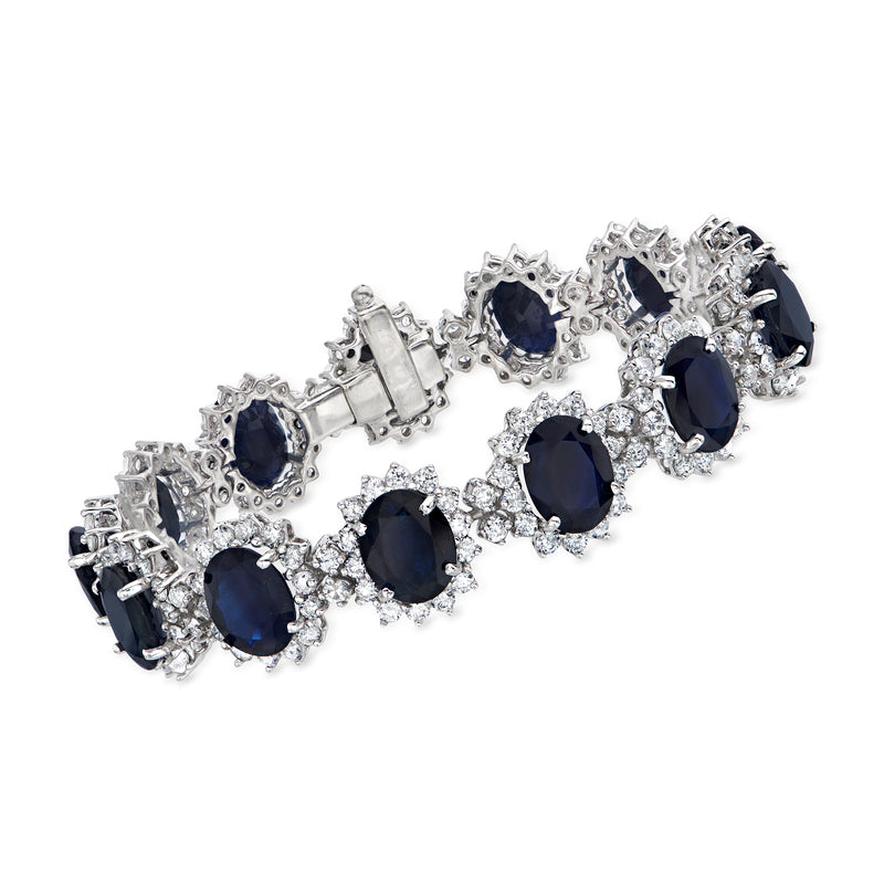 14kt white gold bracelet with oval dark blue sapphire clusters and diamond accents