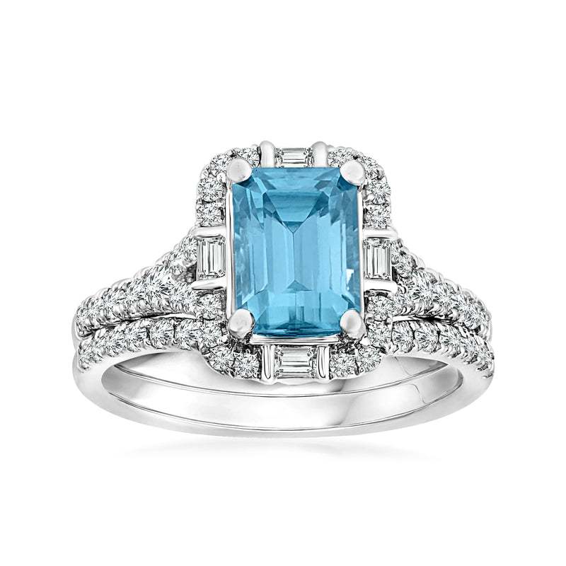 Blue zircon emerald-cut ring in white gold with diamond halo and side baguettes