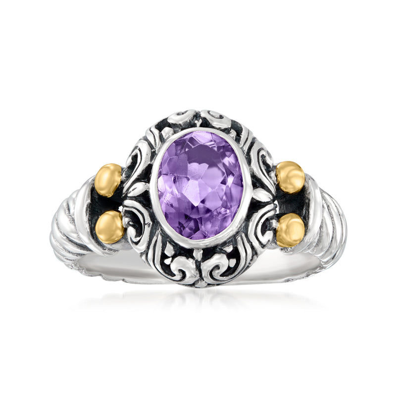 Sterling silver Bali-style ring with oval amethyst center and 18kt yellow gold accents