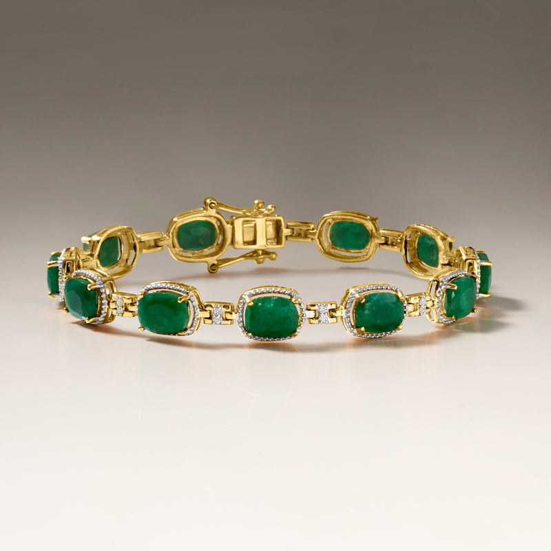Emerald and diamond bracelet with green oval stones and bezel settings, gold over sterling