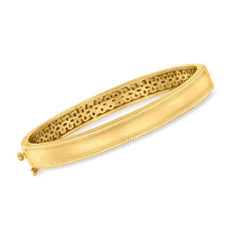 Gold over sterling bangle bracelet with perforated center and scalloped edge