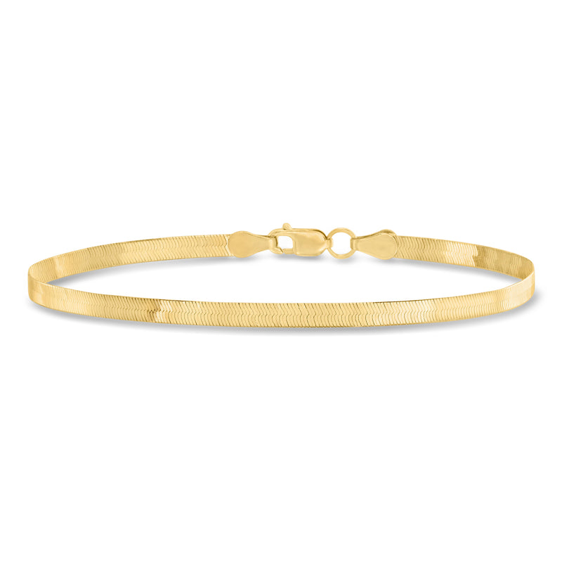 Yellow gold herringbone bracelet with round clasp