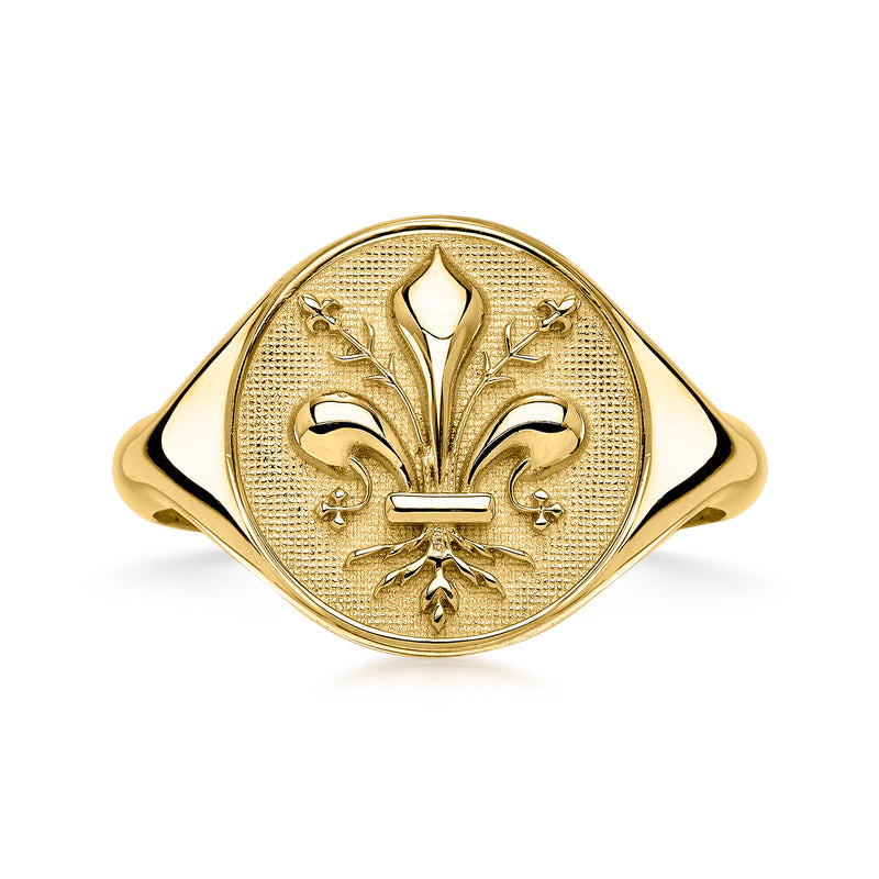 Yellow gold fleur-de-lis signet ring with round top medallion and engraved crest