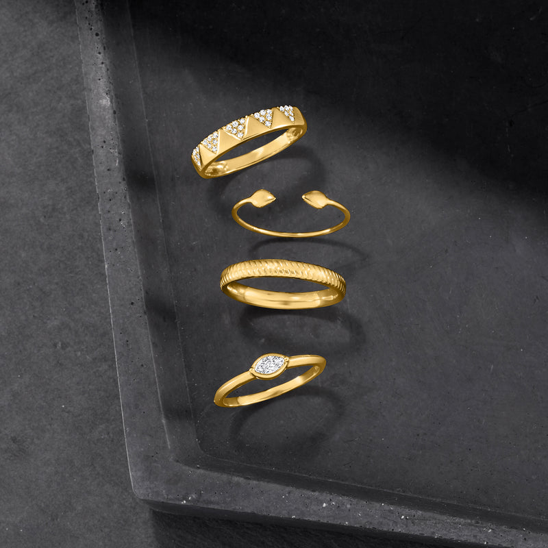 Textured yellow gold band ring with raised snake-skin pattern