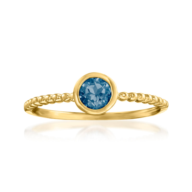 14kt yellow gold beaded ring with London blue topaz oval center gemstone