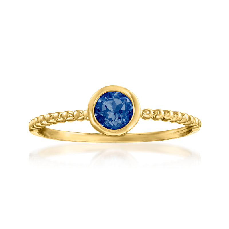 14kt yellow gold sapphire beaded ring with round blue gemstone in gold bezel