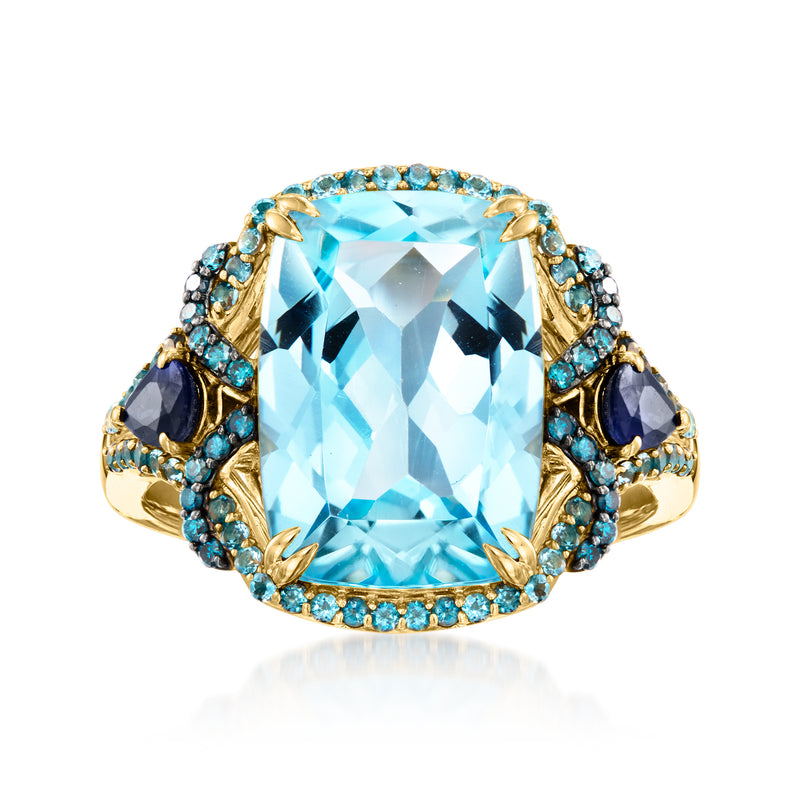 14kt yellow gold ring with large sky-blue cushion gemstone and blue sapphire accents