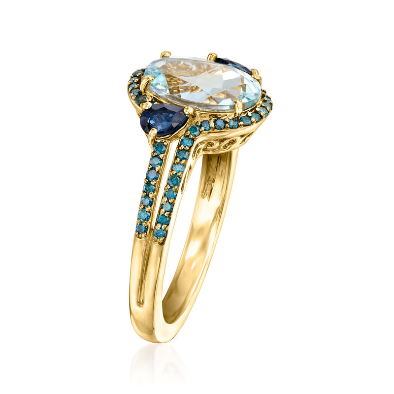 14kt yellow gold ring with large oval aquamarine gemstone, blue sapphires channel set