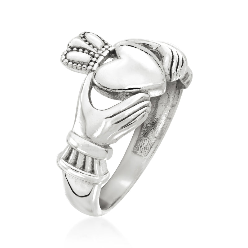 Sterling silver claddagh ring angled view, heart center with hands and crown motif