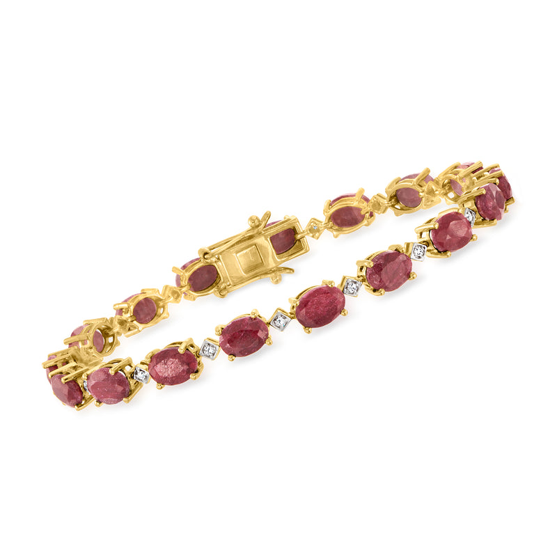 Gold bracelet with oval ruby stones and small diamond accents, prong-set with links