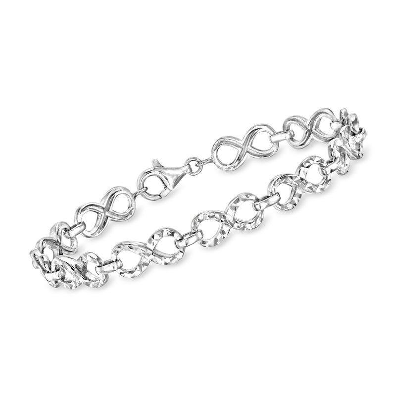 Sterling silver infinity-link bracelet with oval links and two small charms