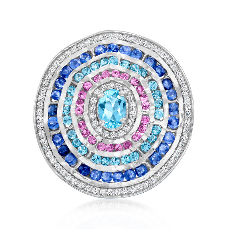 Sterling silver ripple ring with oval light-blue center, blue, pink, and aquamarine stones