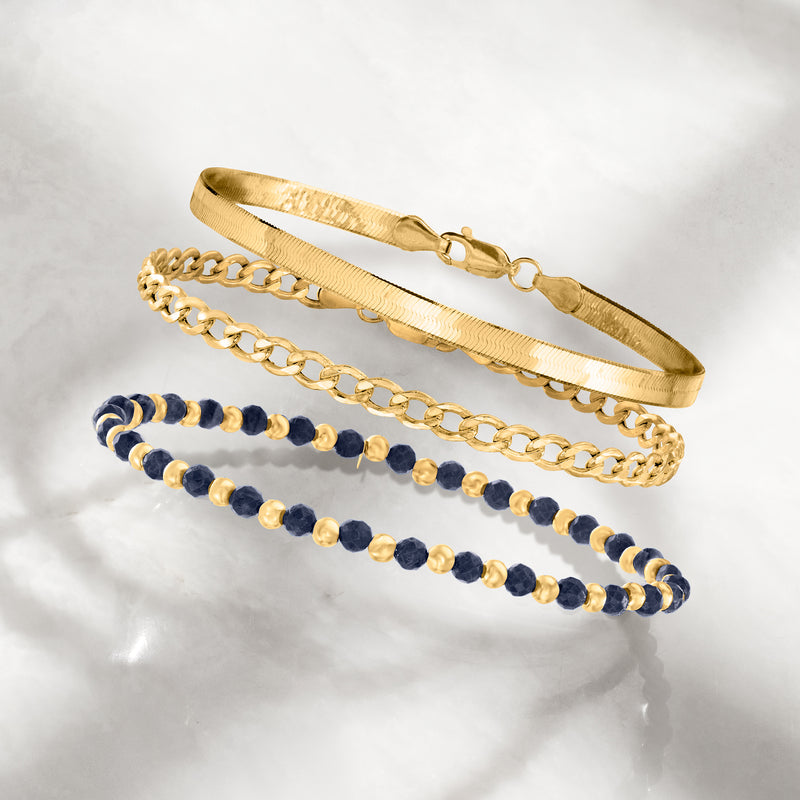 10kt yellow gold curb-link bracelet, open chain with clasp detail