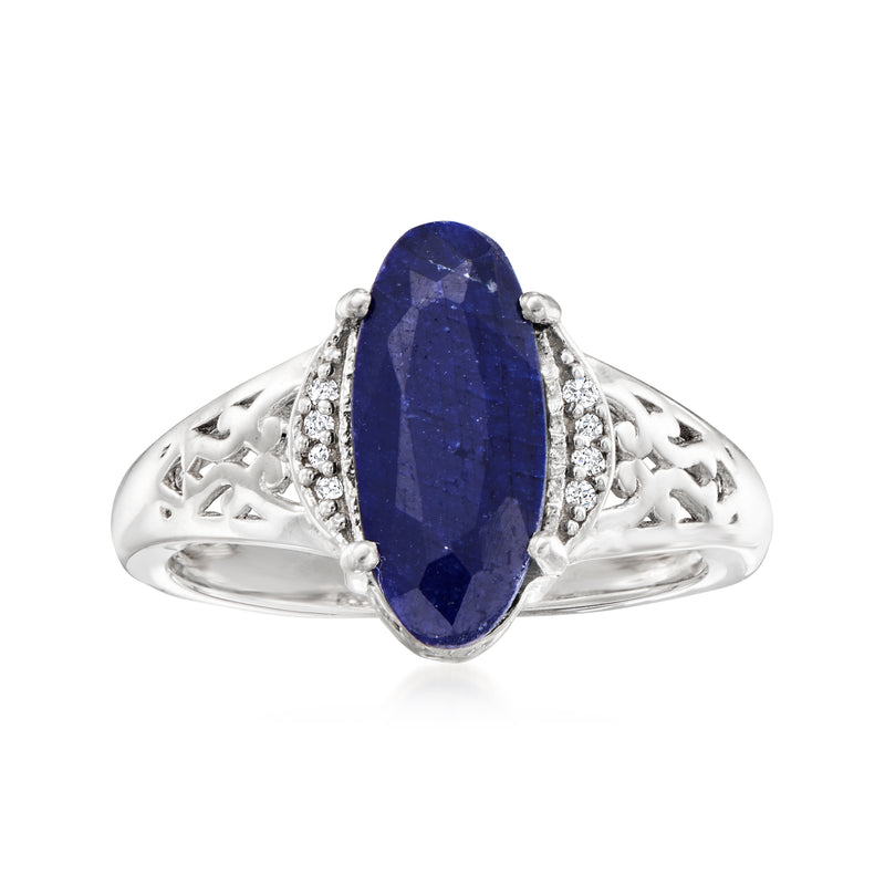 Oval dark blue sapphire ring in sterling silver with diamond accents and filigree band