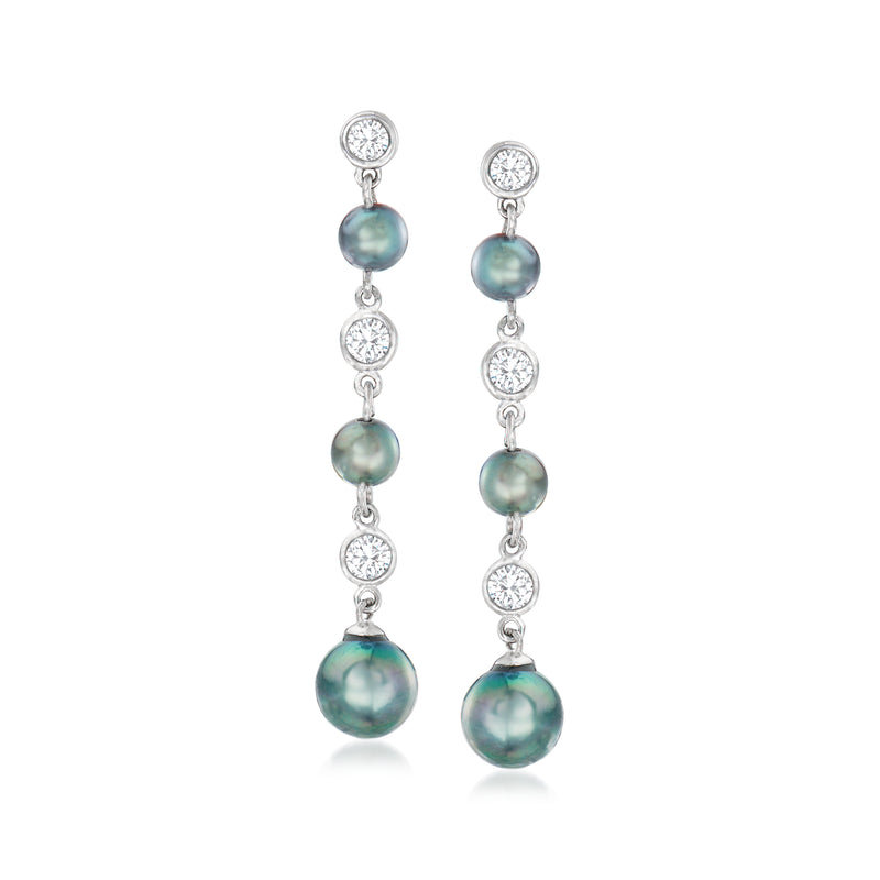Sterling silver drop earrings with teal cultured pearl drops and white crystal accents