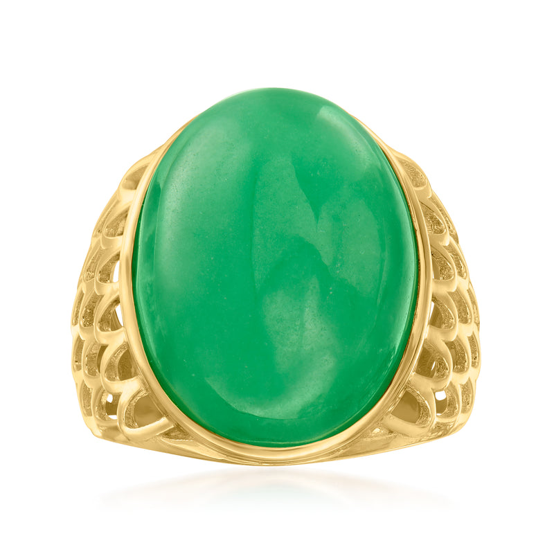 Green jade oval cabochon ring with gold-tone setting and detailed filigree band