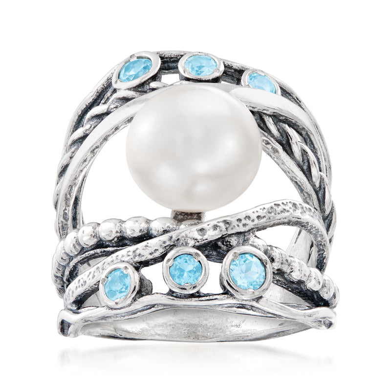 Sterling silver ring with white cultured pearl and round blue topaz accents