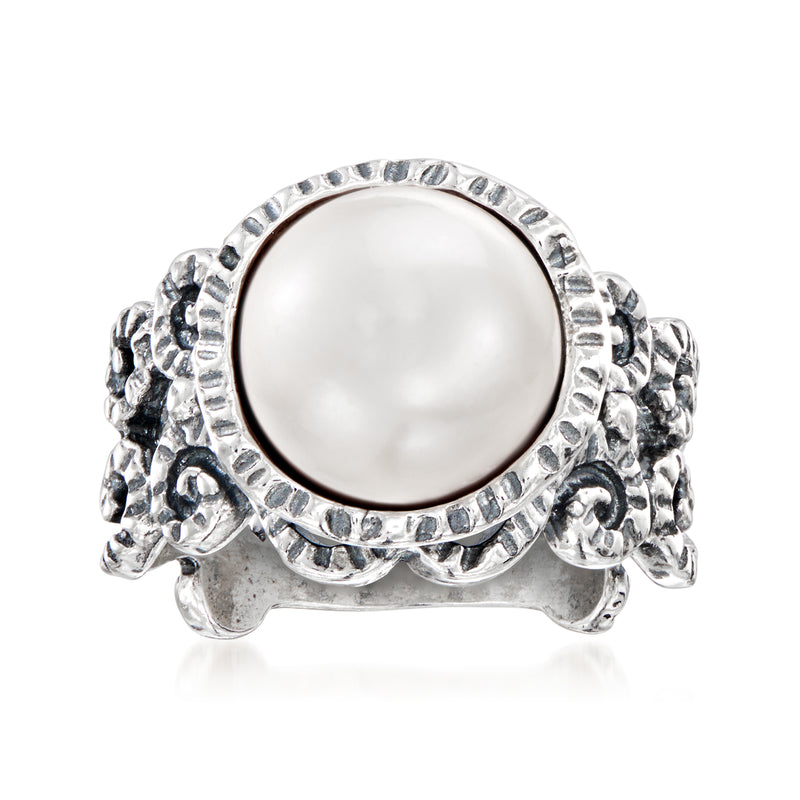 Sterling silver ring with round cultured button pearl and ornate scrollwork setting