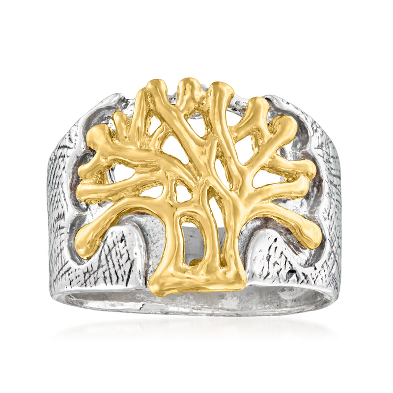 Two-tone sterling silver openwork Tree of Life ring with raised gold centerpiece.