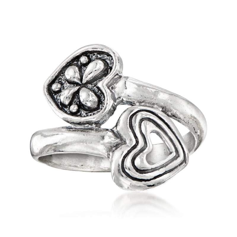 Sterling silver bypass heart ring with two heart cutouts and polished band