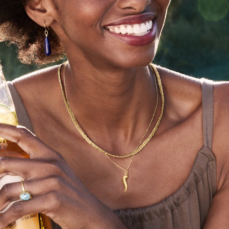10kt yellow gold Byzantine chain necklace with small curved charm