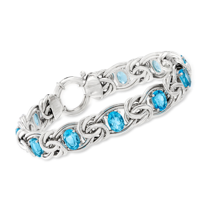 Sterling silver bracelet with oval Swiss blue topaz gemstones in a linked chain