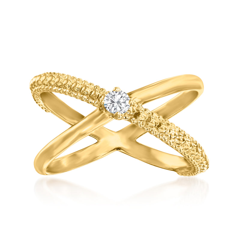 Gold crisscross ring with round diamond center, textured band details