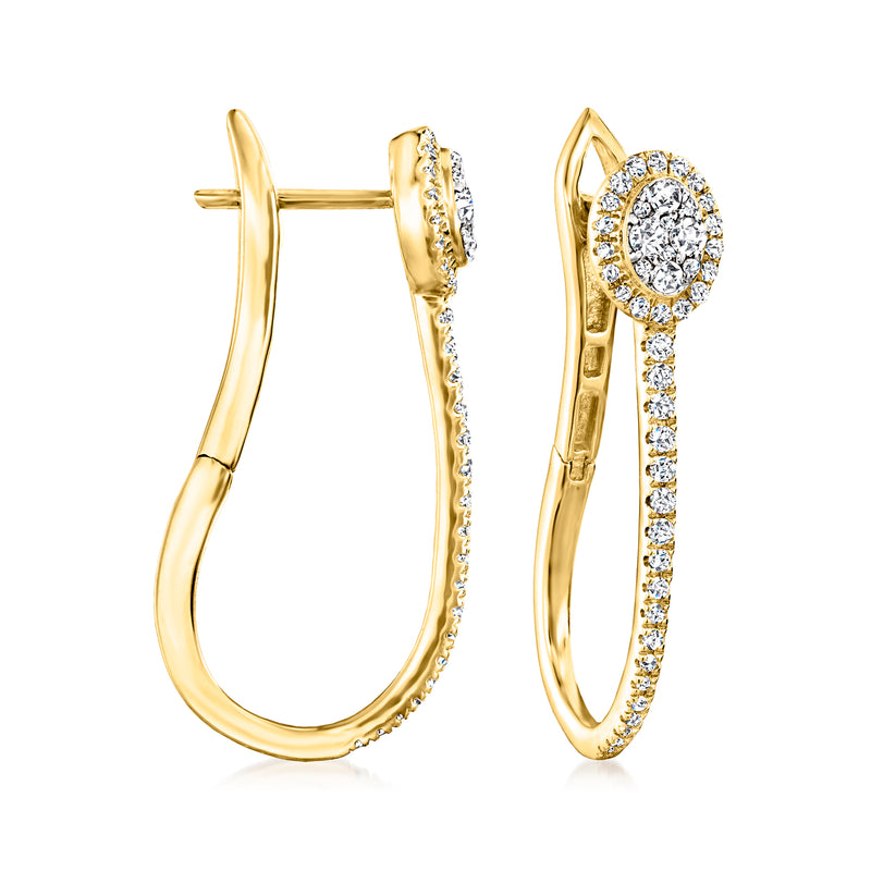 Elongated gold hoop earrings with diamond cluster halo and row stones