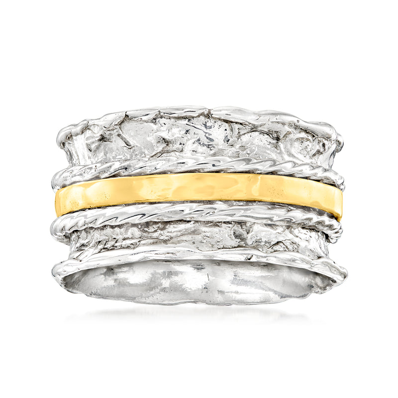 Sterling silver spinner ring with textured bands and polished 14kt yellow gold center