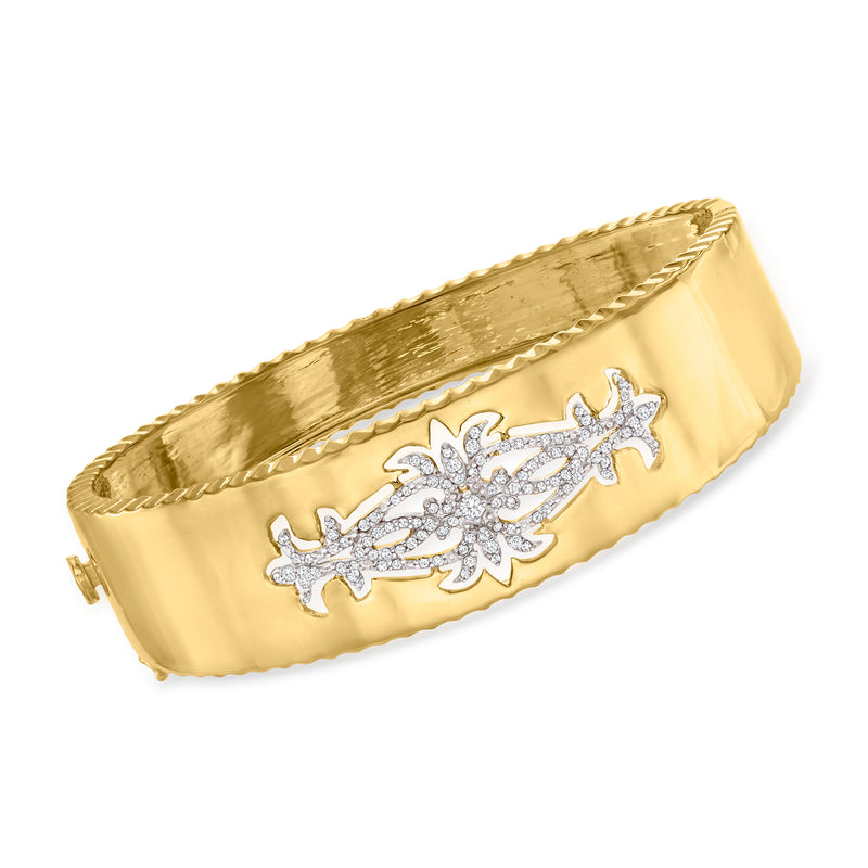 18kt gold over sterling bangle bracelet with open space floral diamond-like accents