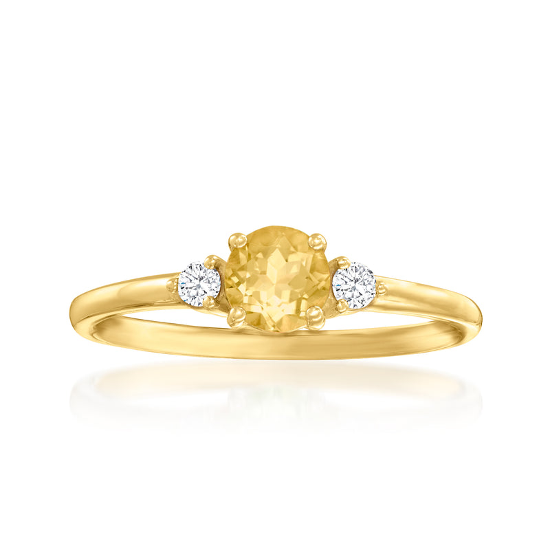 14kt yellow gold ring with oval citrine center and two round diamond accents