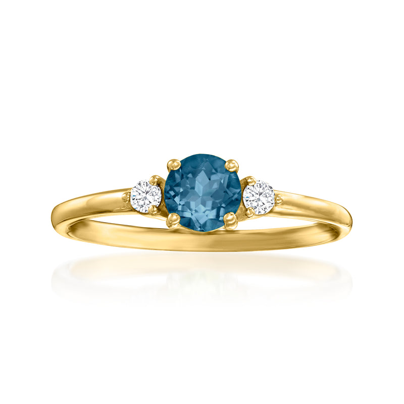 14kt yellow gold ring with oval london blue topaz and two round diamond accents