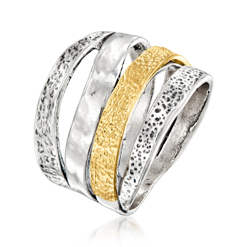 Multi-row textured ring with gold center stripe and speckled silver outer bands, side view