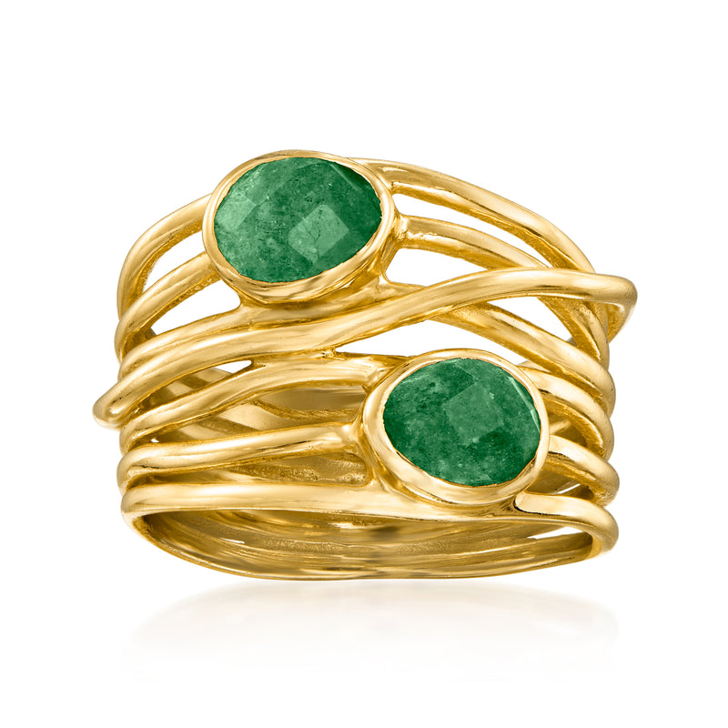 Gold wrap ring with two oval green gemstones in open crisscross bands