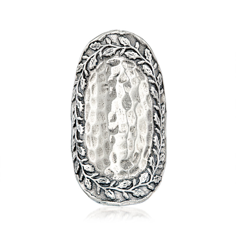 Sterling silver leaf-framed oval ring with textured polished centerpiece.