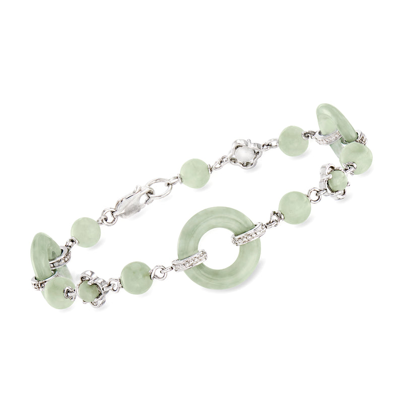 Sterling silver bracelet with green jade beads and a circular jade station charm