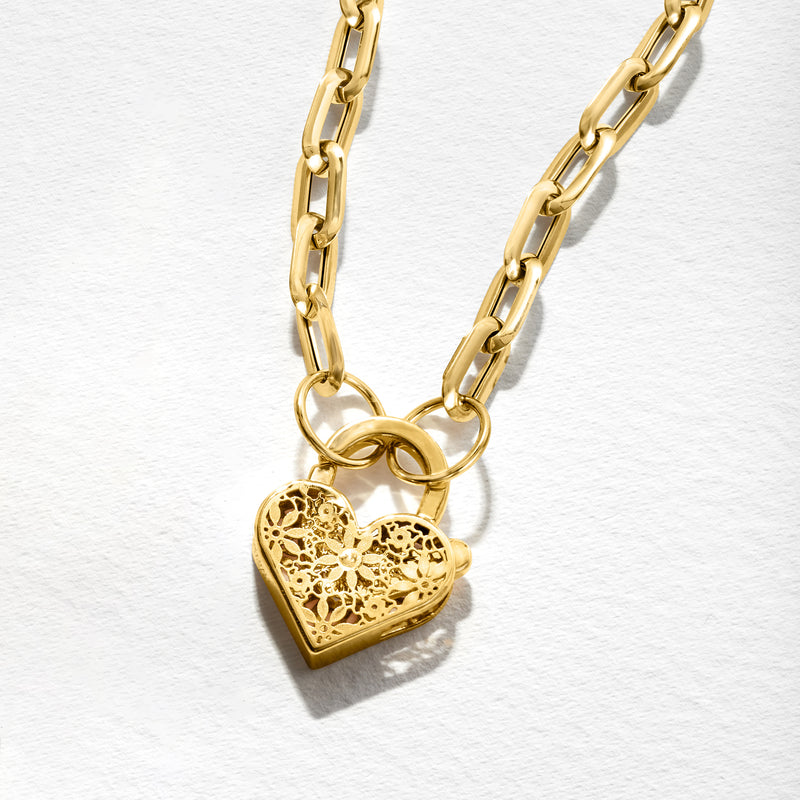 Yellow gold heart pendant necklace with floral cutout heart charm and chunky chain links