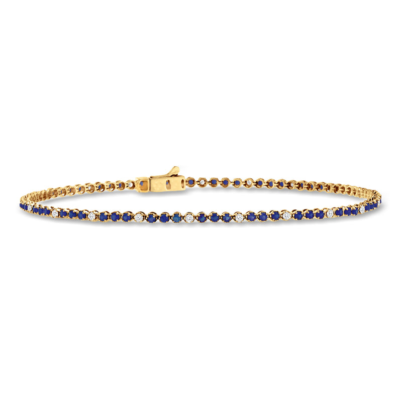 14kt yellow gold tennis bracelet with sapphire and diamond accents, oval setting