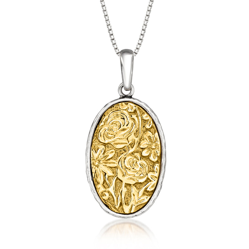 Two-tone sterling silver oval floral pendant necklace with gold-toned engraved center