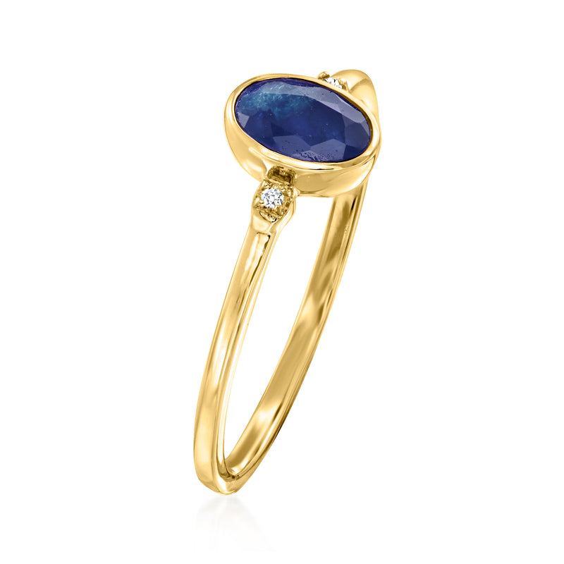 Oval blue sapphire ring in 14kt yellow gold, with diamond accents on band
