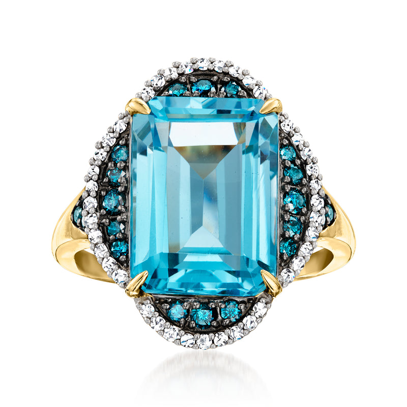 14kt yellow gold ring with large Swiss-blue topaz, diamond halo and blue stones