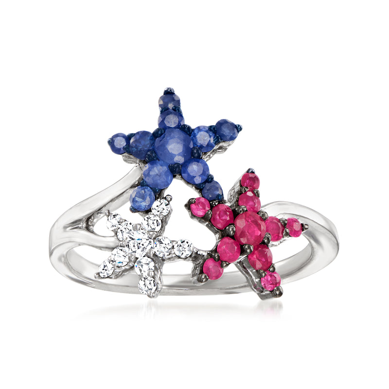 Sterling silver ring with blue sapphire and pink ruby star clusters, diamond accents