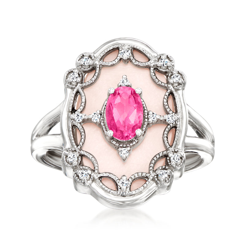 Sterling silver ring with pink oval center stone and diamond accents, openwork halo