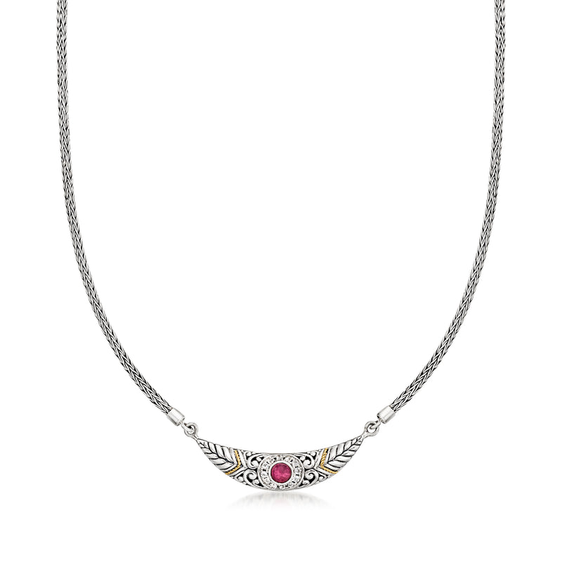 Sterling silver Bali-style necklace with crescent pendant, pink center stone, white accents
