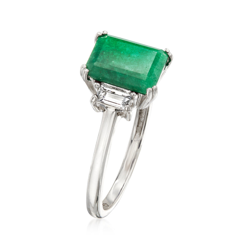 Sterling silver square emerald-green ring with baguette side stones, angled view