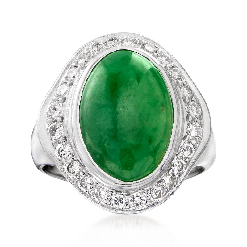 Vintage oval jade ring in 18kt white gold with diamond halo and tapered shoulders