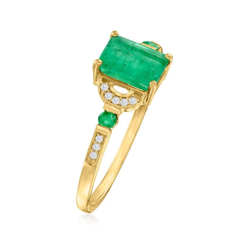 10kt yellow gold ring with square green emerald center, diamond details, and green side stones
