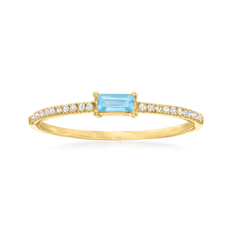 10kt yellow gold ring with Swiss blue topaz center and diamond pave band
